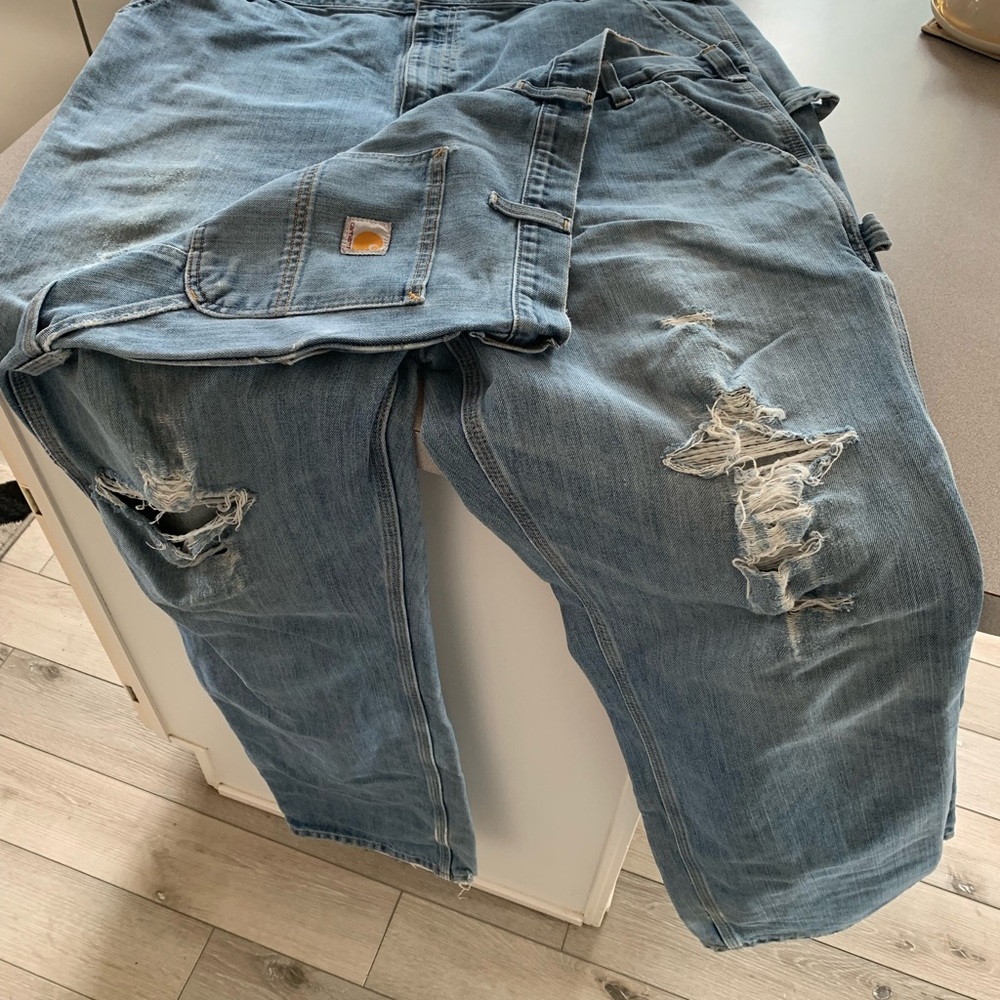 Carhartt painter pants. Distressed and destroyed in all the right places.